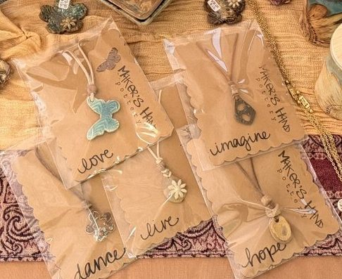 Word pendants: love, live, dance, imagine, hope